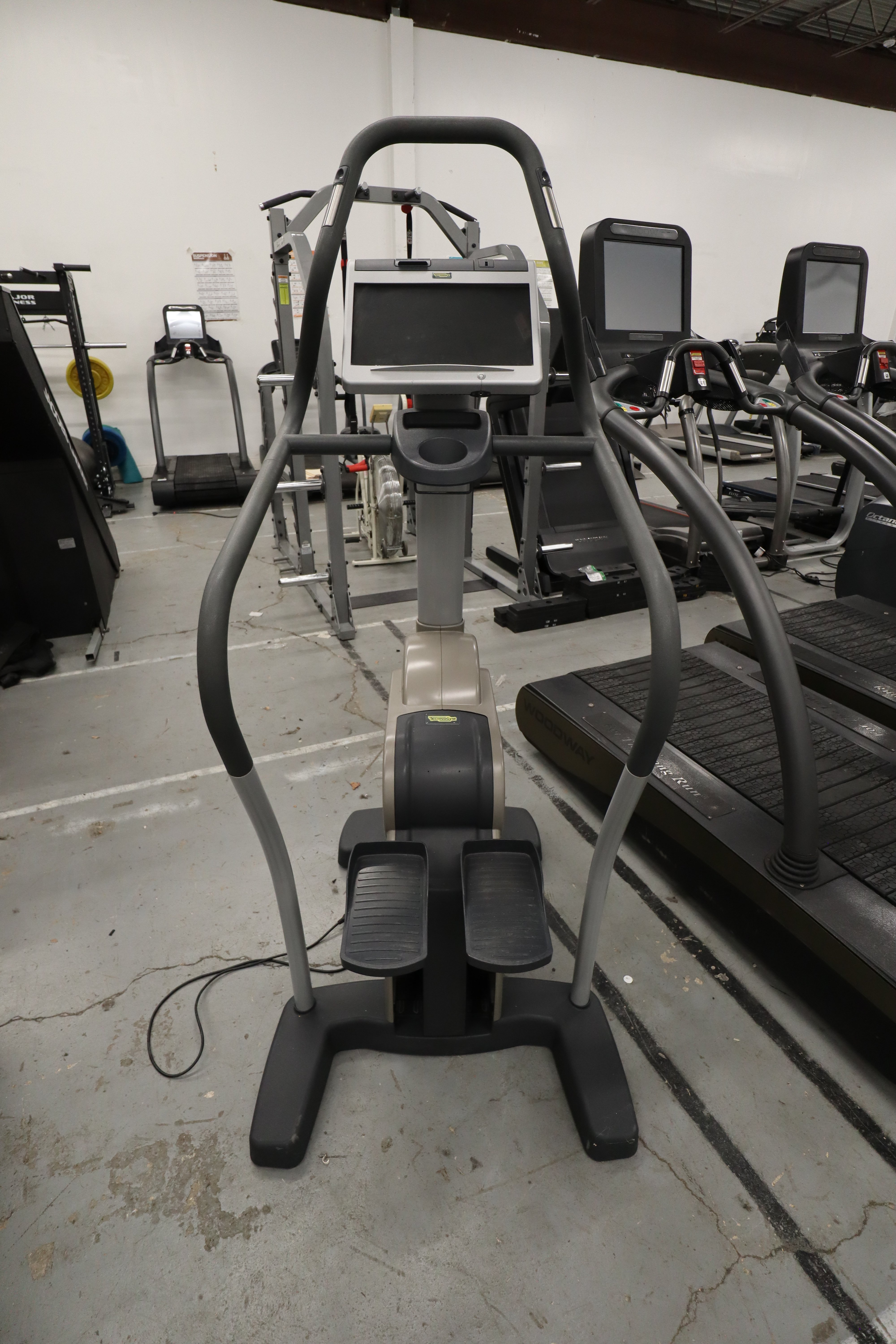 Used Technogym Step Excite 700 DA37 Upright Stepper